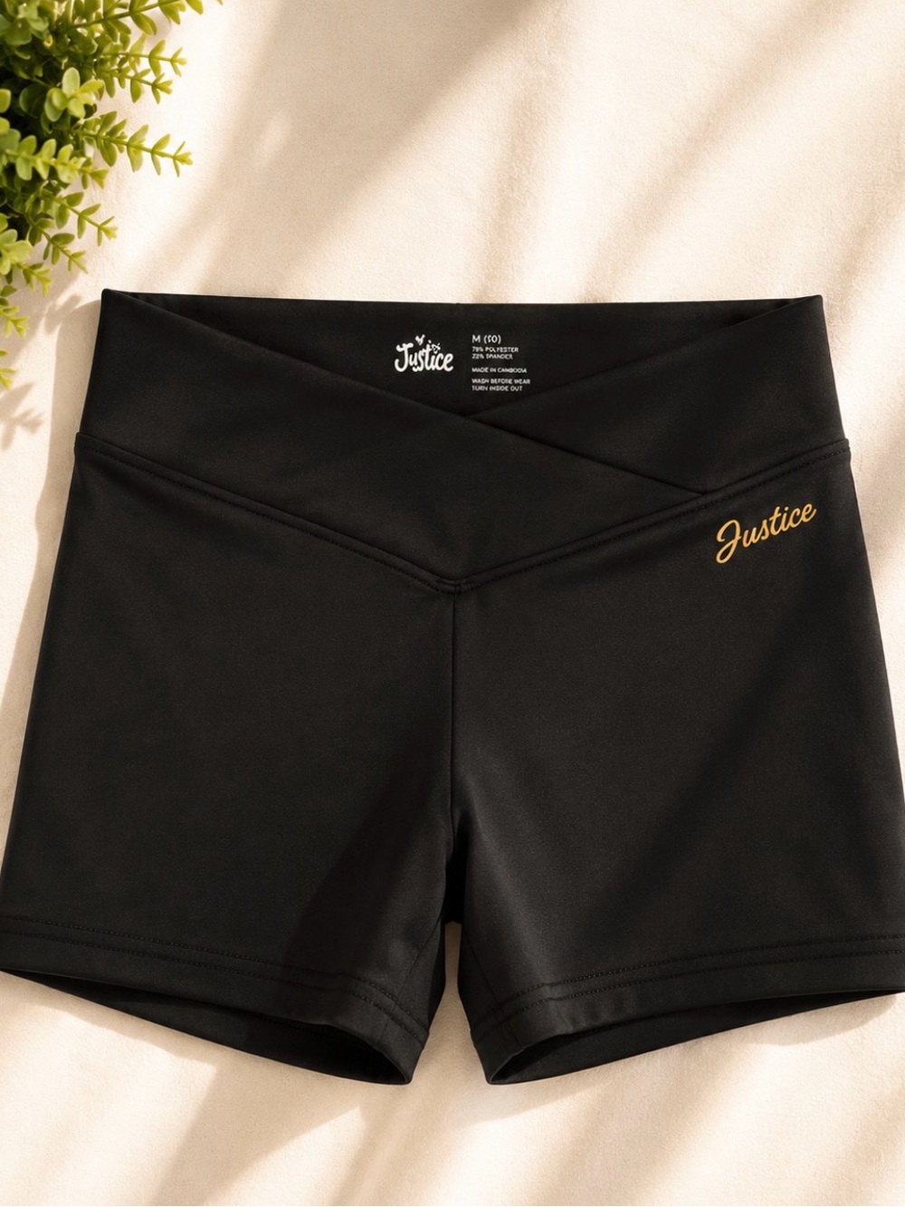 Justice Black V-Waist Athletic Shorts with Gold Logo